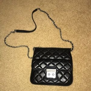 Micheal Kors cross body purse... never used!!